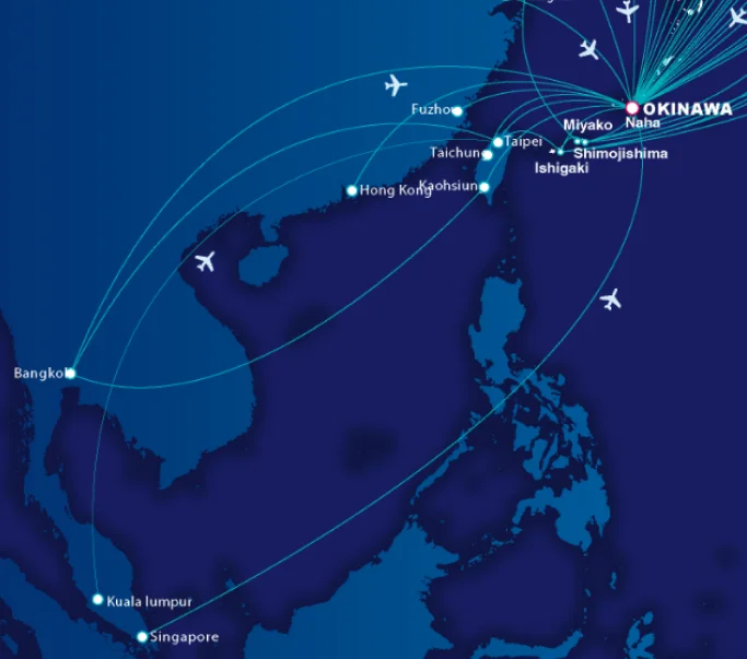A dark blue map displays white flight paths connecting various Asian cities to Okinawa, Japan.